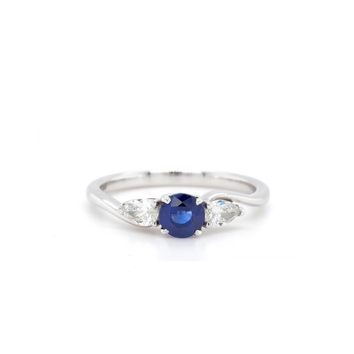 18ct White Gold Round Central Sapphire 4 Claw and Diamond 3 Stone Ring