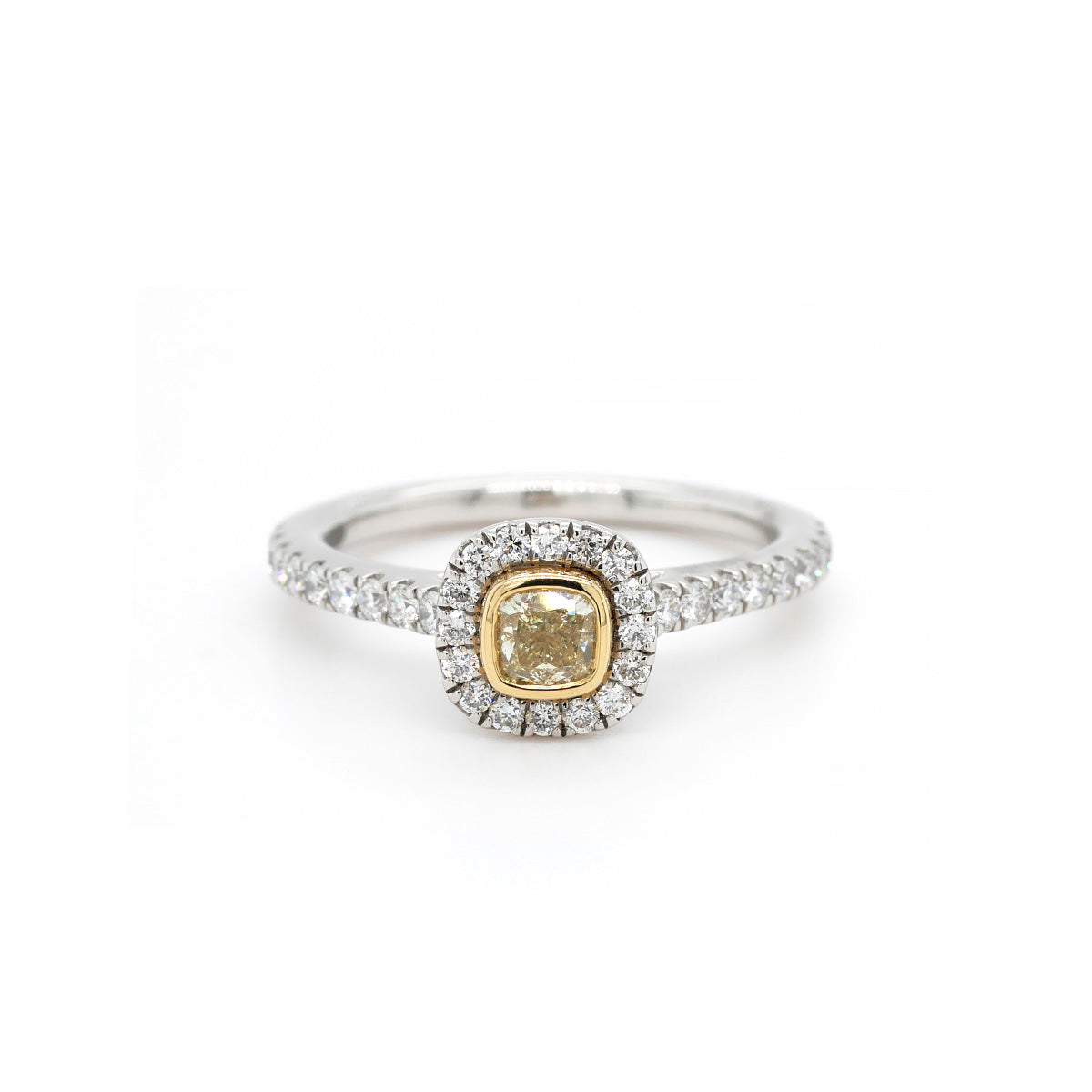 Platinum Ring with Central Rub Over Yellow Diamond